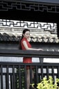 Chinese cheongsam model in Chinese classical garden